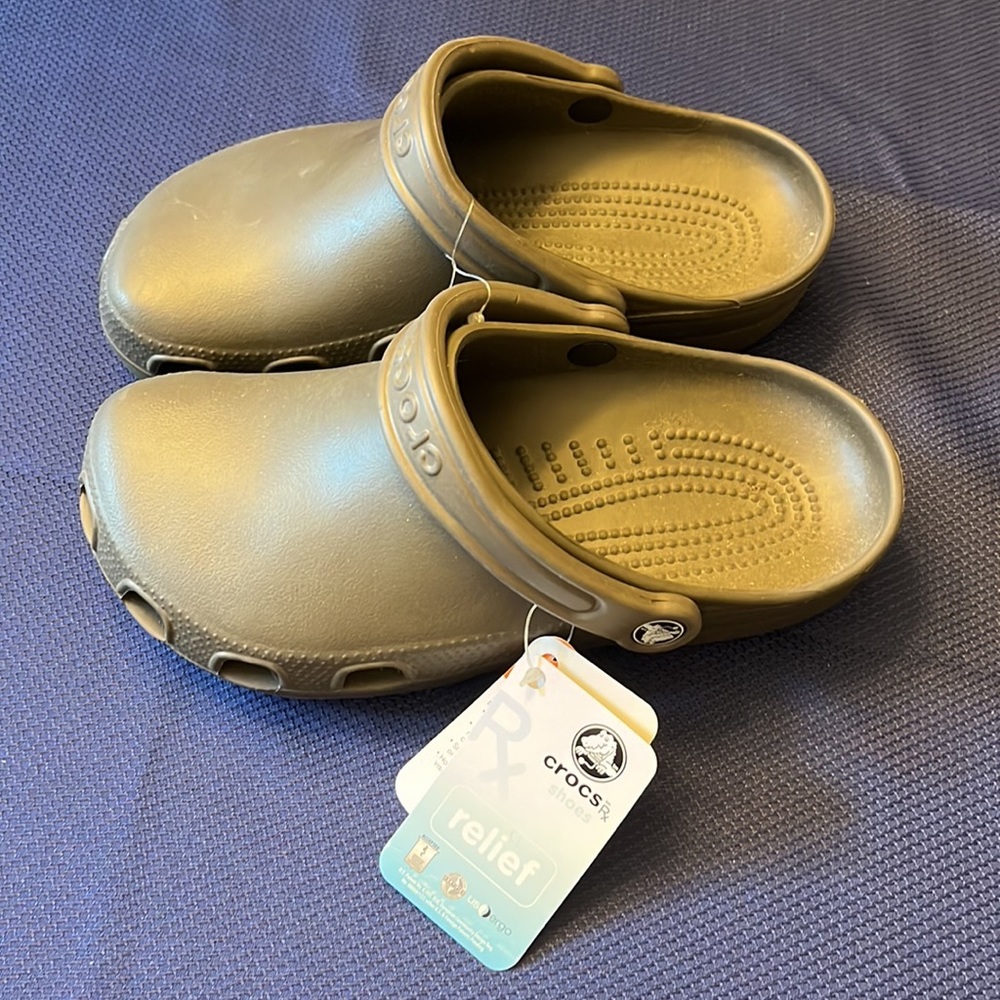 CROCS RX RELIEF- New with tags, men 6, Womans 8.